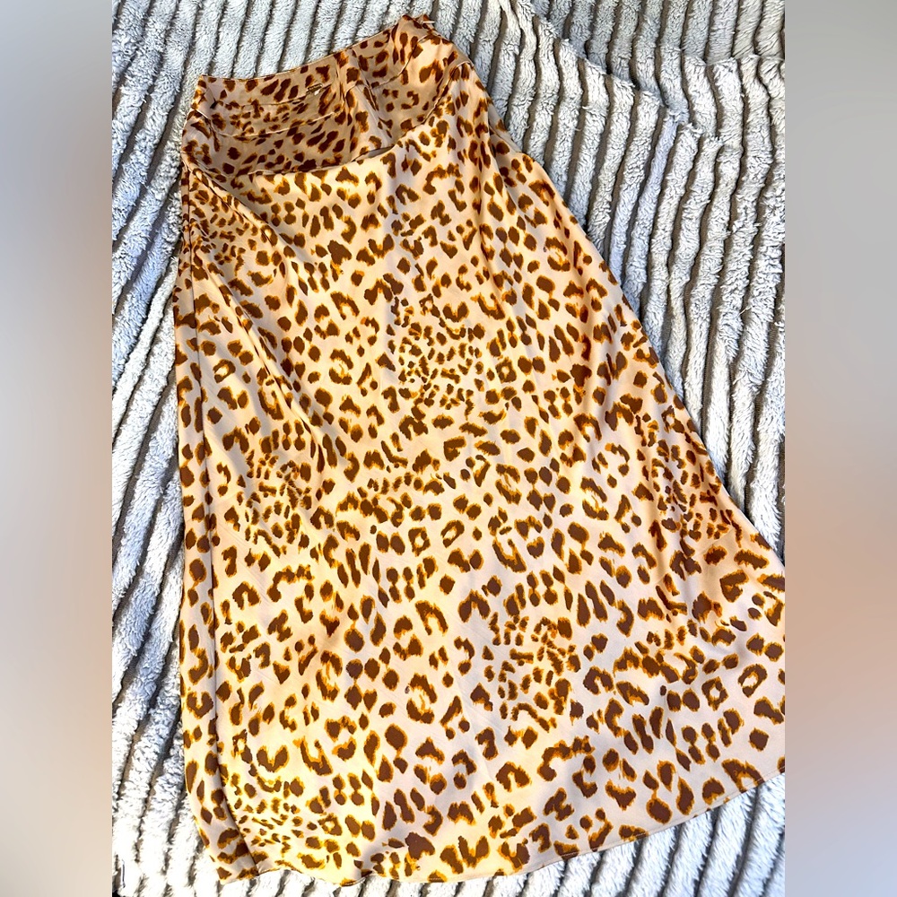 Free People, high rise skirt, with leopard print. Size small.